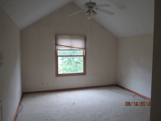 19105 McGuire Road Harvard, IL 60033 - Photo 13 of 16 an empty room with a window