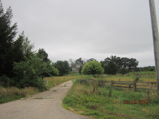 19105 McGuire Road Harvard, IL 60033 - Photo 5 of 16 a view of a field with trees in background