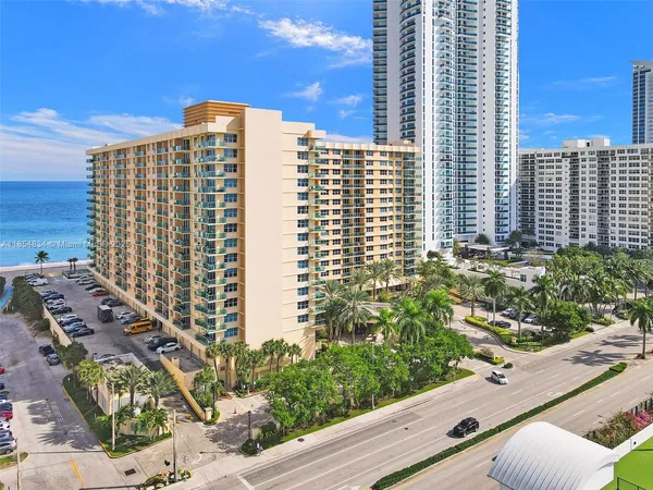 a view of a city with tall buildings