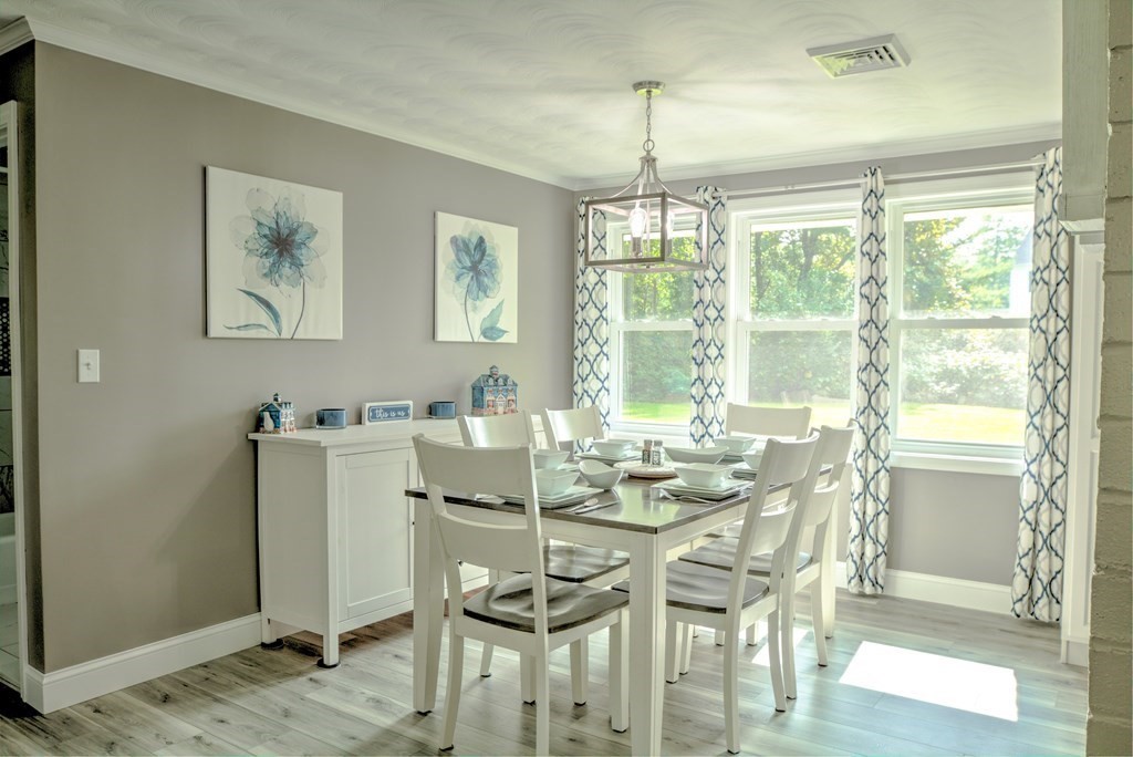 44 Ruthellen Road Chelmsford, MA 01824 - Photo 13 of 42 a view of a dining room with furniture window and outside view