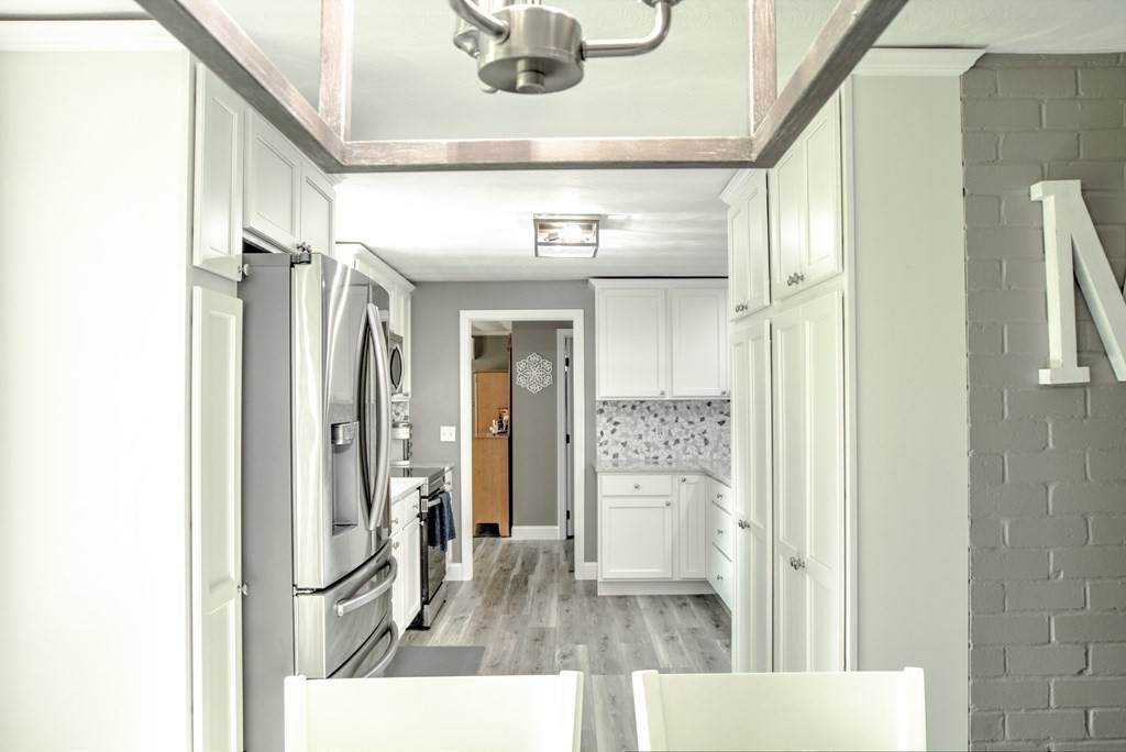 44 Ruthellen Road Chelmsford, MA 01824 - Photo 16 of 42 a bathroom with a tub and shower