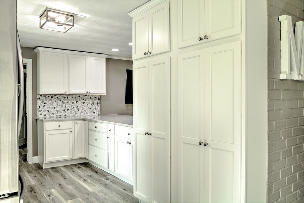 44 Ruthellen Road Chelmsford, MA 01824 - Photo 18 of 42 a bathroom with a double vanity sink and mirror