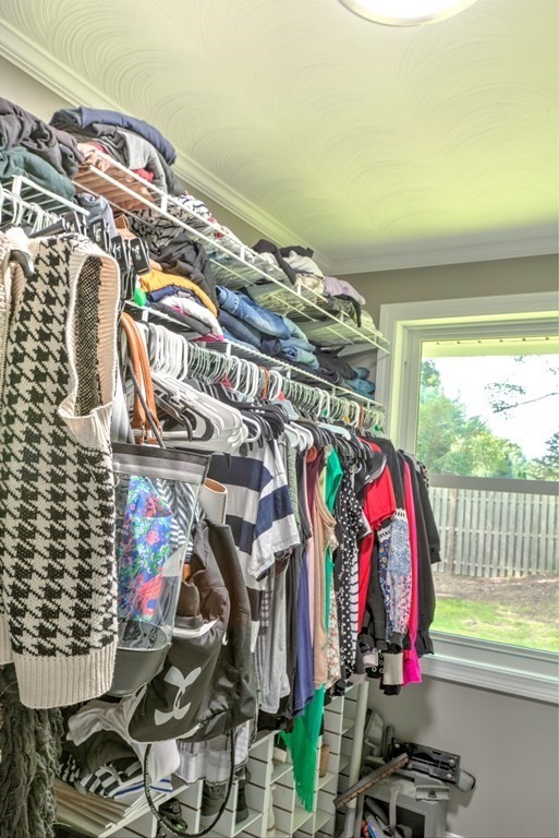 44 Ruthellen Road Chelmsford, MA 01824 - Photo 28 of 42 a view of walk in closet with clothes