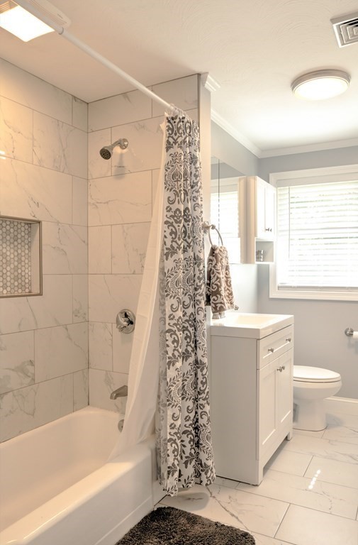 44 Ruthellen Road Chelmsford, MA 01824 - Photo 29 of 42 a bathroom with a bathtub a sink and a shower