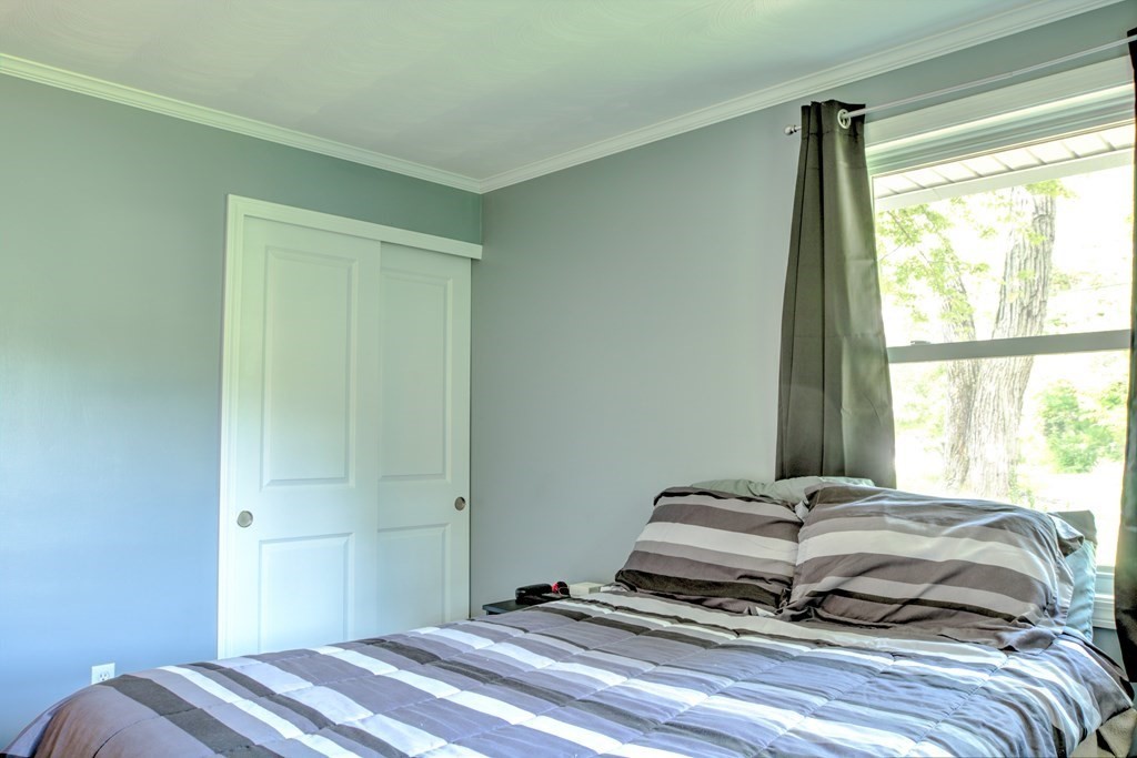 44 Ruthellen Road Chelmsford, MA 01824 - Photo 34 of 42 a bedroom with a bed and a window