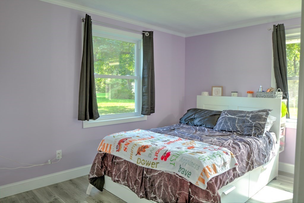 44 Ruthellen Road Chelmsford, MA 01824 - Photo 36 of 42 a bedroom with a bed and a window