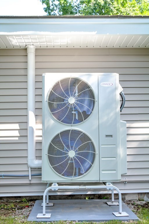 44 Ruthellen Road Chelmsford, MA 01824 - Photo 41 of 42 a room with a table and chairs