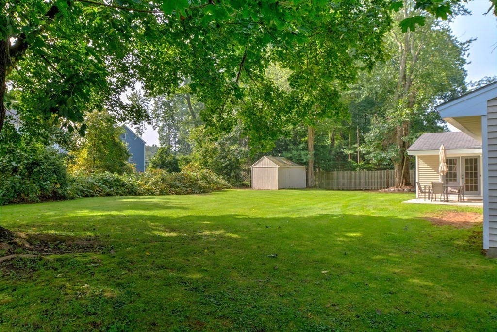 44 Ruthellen Road Chelmsford, MA 01824 - Photo 6 of 42 a view of a house with a yard and a tree