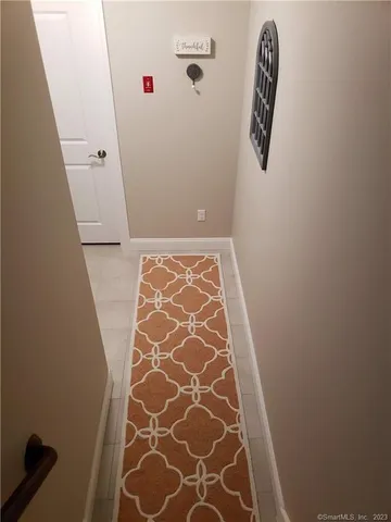 a bathroom with a shower and a window