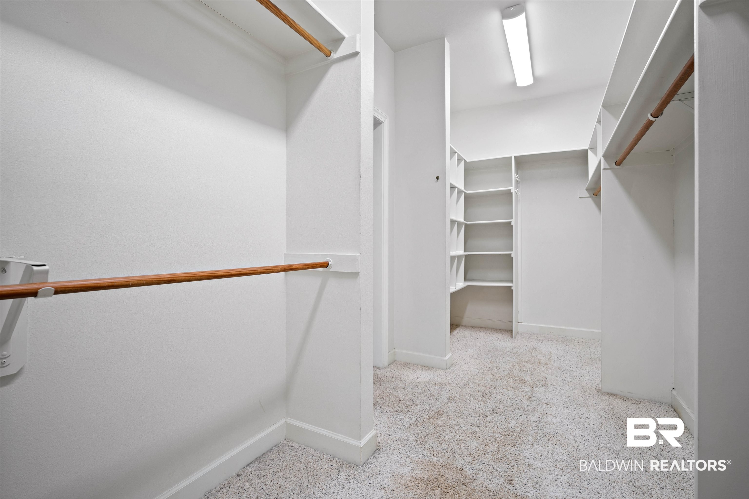 204 General Canby Loop Daphne, AL 36527 - Photo 21 of 36 Walk in closet featuring light carpet