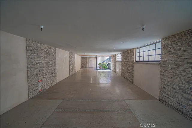 a view of empty room with windows