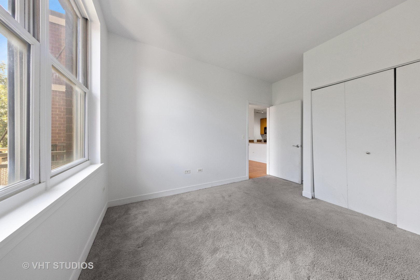 765 West 15th Street, Unit 309 Chicago, IL 60607 - Photo 14 of 14 a view of an empty room with a window