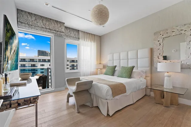 a view of a lake with outdoor seating