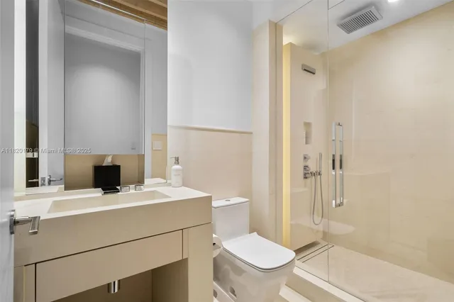 a view of a patio with a table chairs and a patio