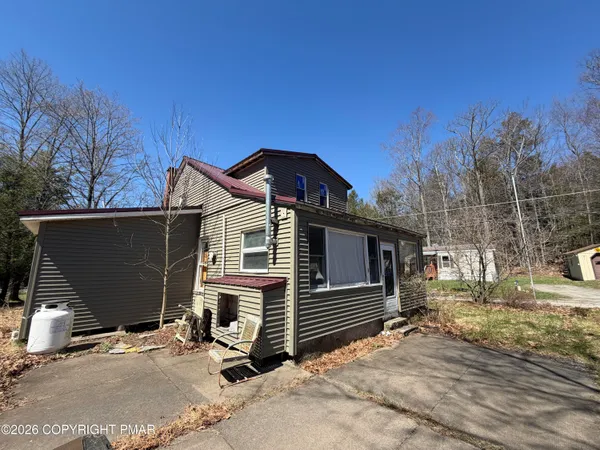 a view of a house with a patio