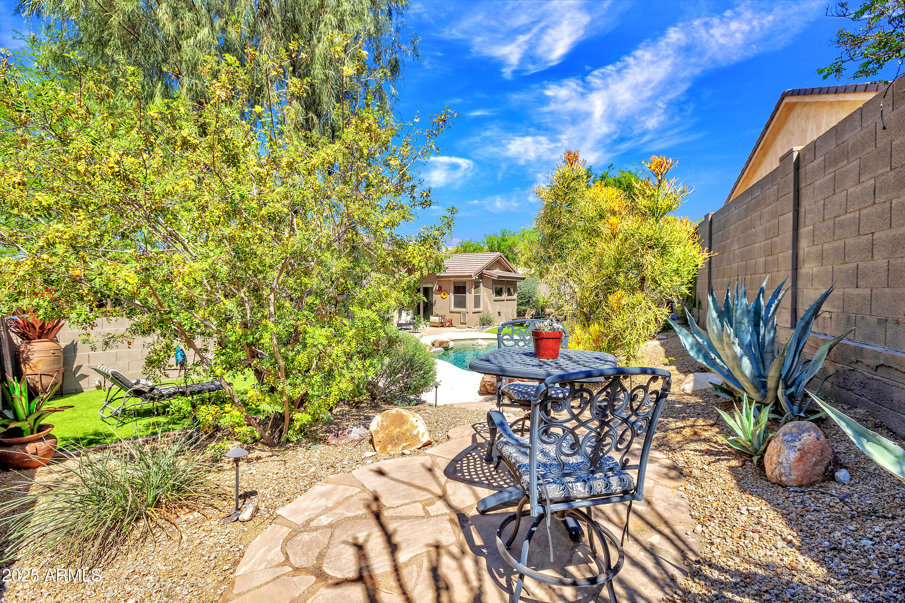 10655 East Acacia Drive Scottsdale, AZ 85255 - Photo 42 of 46 a view of a chairs and table in the patio