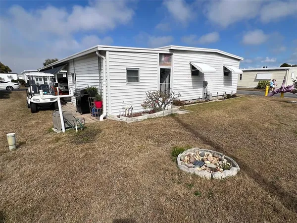 a view of a house with a patio