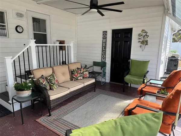 a balcony with furniture