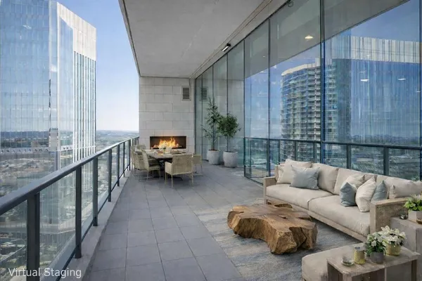 a balcony with furniture