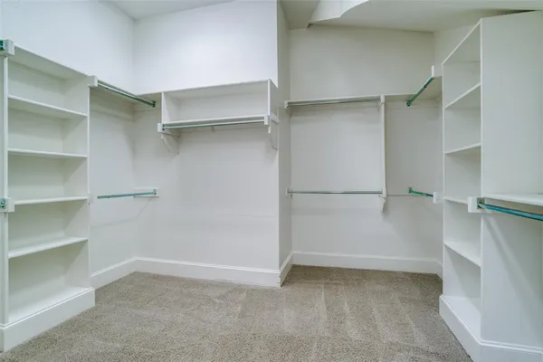 a kitchen with white cabinets