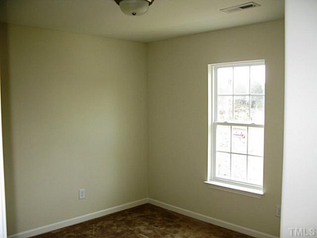 2717 Manthorp Terrace Raleigh, NC 27610 - Photo 9 of 16 an empty room with a window