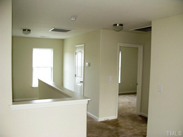 2717 Manthorp Terrace Raleigh, NC 27610 - Photo 10 of 16 a view of a hallway with a bathroom