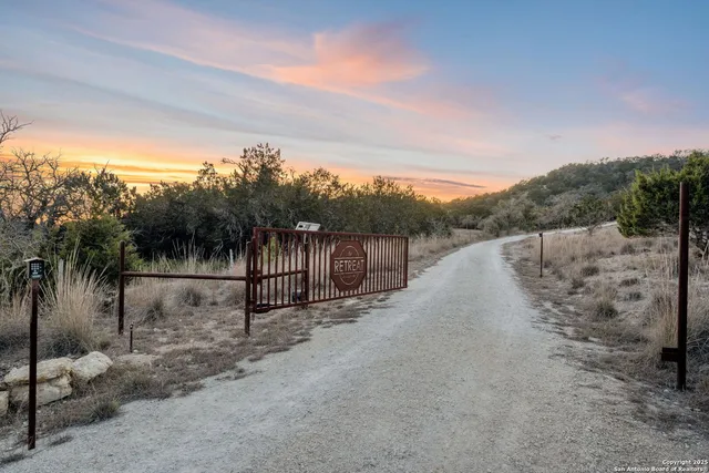 a view of a terrace with wooden floor and fence