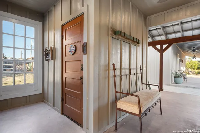 a kitchen with a sink cabinets and window