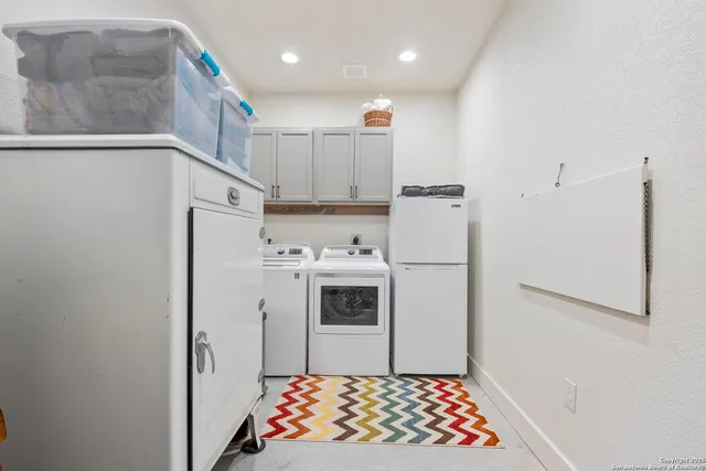 a view of a chairs and table in the yard