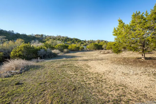 a view of swimming pool with porch and furniture