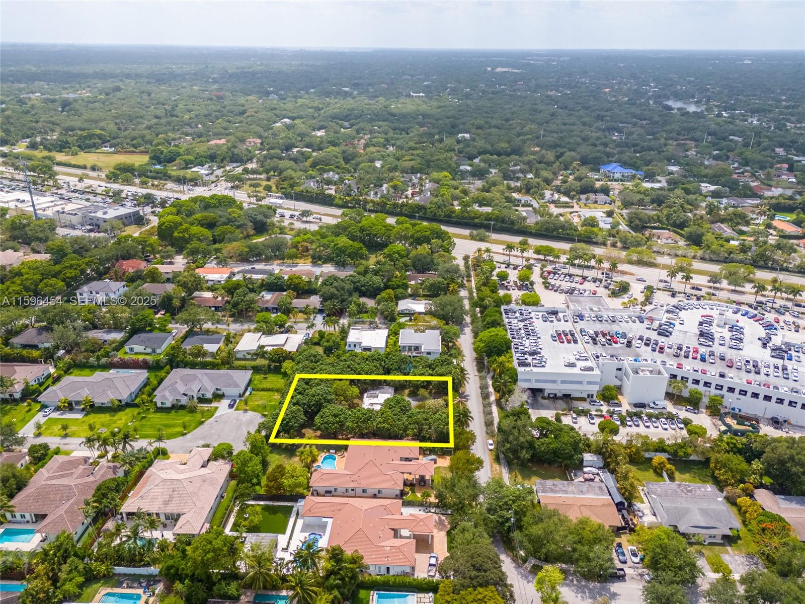 7800 Southwest 110th Street Pinecrest, FL 33156 - Photo 7 of 12 an aerial view of residential houses with city view