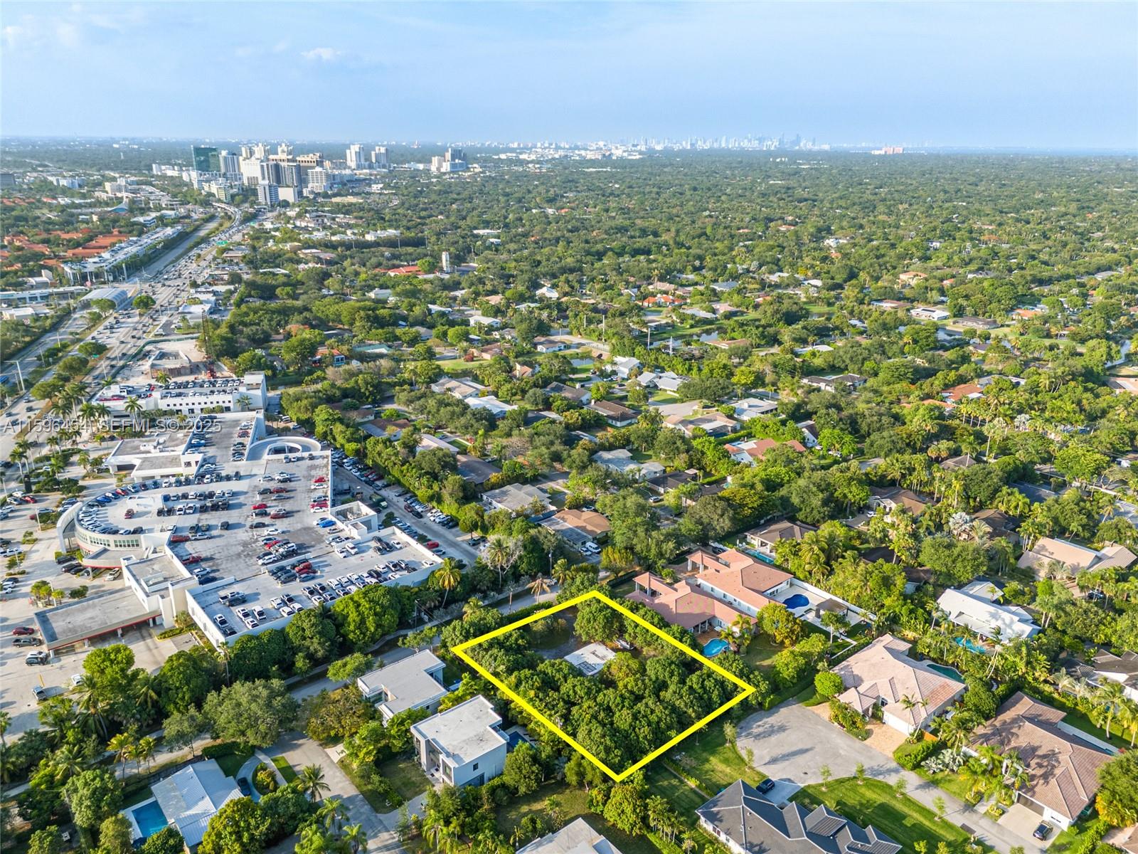 7800 Southwest 110th Street Pinecrest, FL 33156 - Photo 10 of 12 an aerial view of residential houses with outdoor space