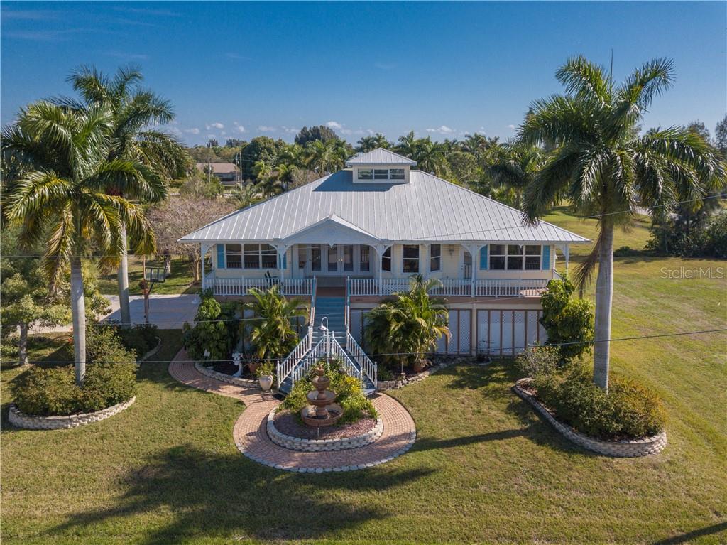883 West Retta Esplanade Punta Gorda, FL 33950 - Photo 1 of 1 UNPARALLELED BY FAR THE BEST VIEW IN PUNTA GORDA OF CHARLOTTE HARBOR INTO DOWNTOWN!