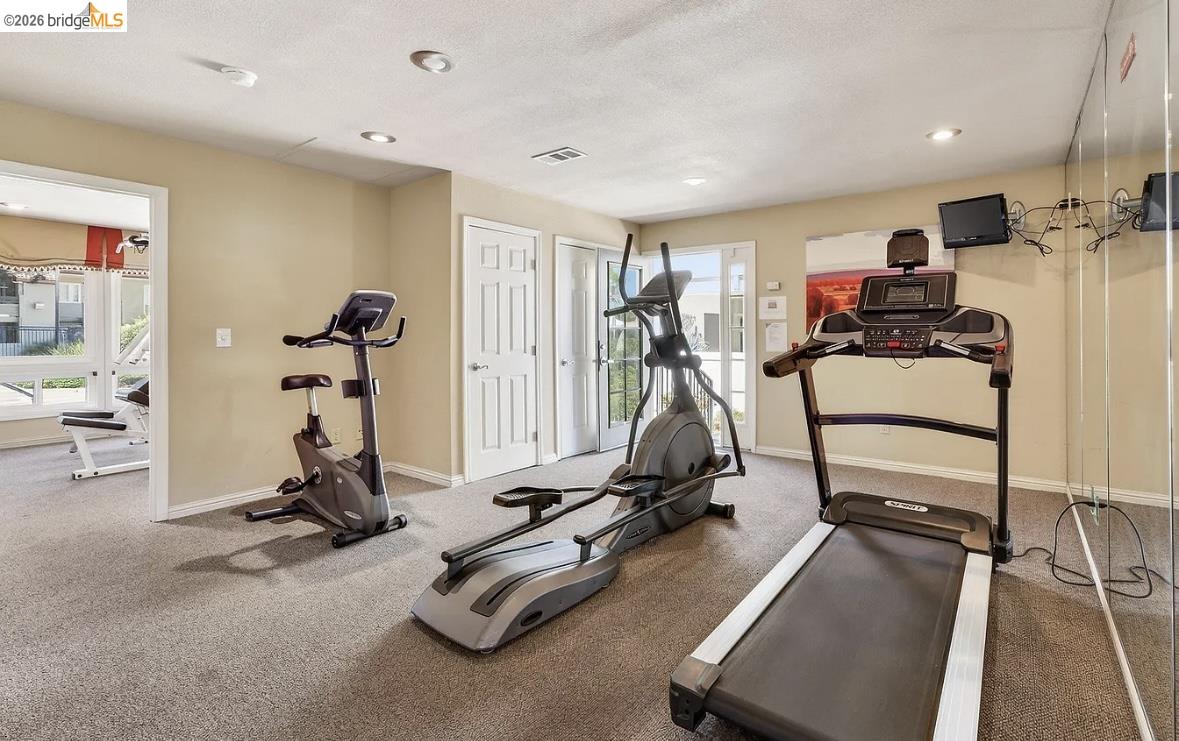 1505 Kirker Pass Road, Unit 214 Concord, CA 94521 - Photo 6 of 55 Dedicated fitness space featuring carpet flooring and recessed lighting
