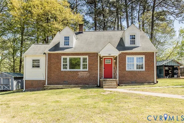 a front view of house with yard