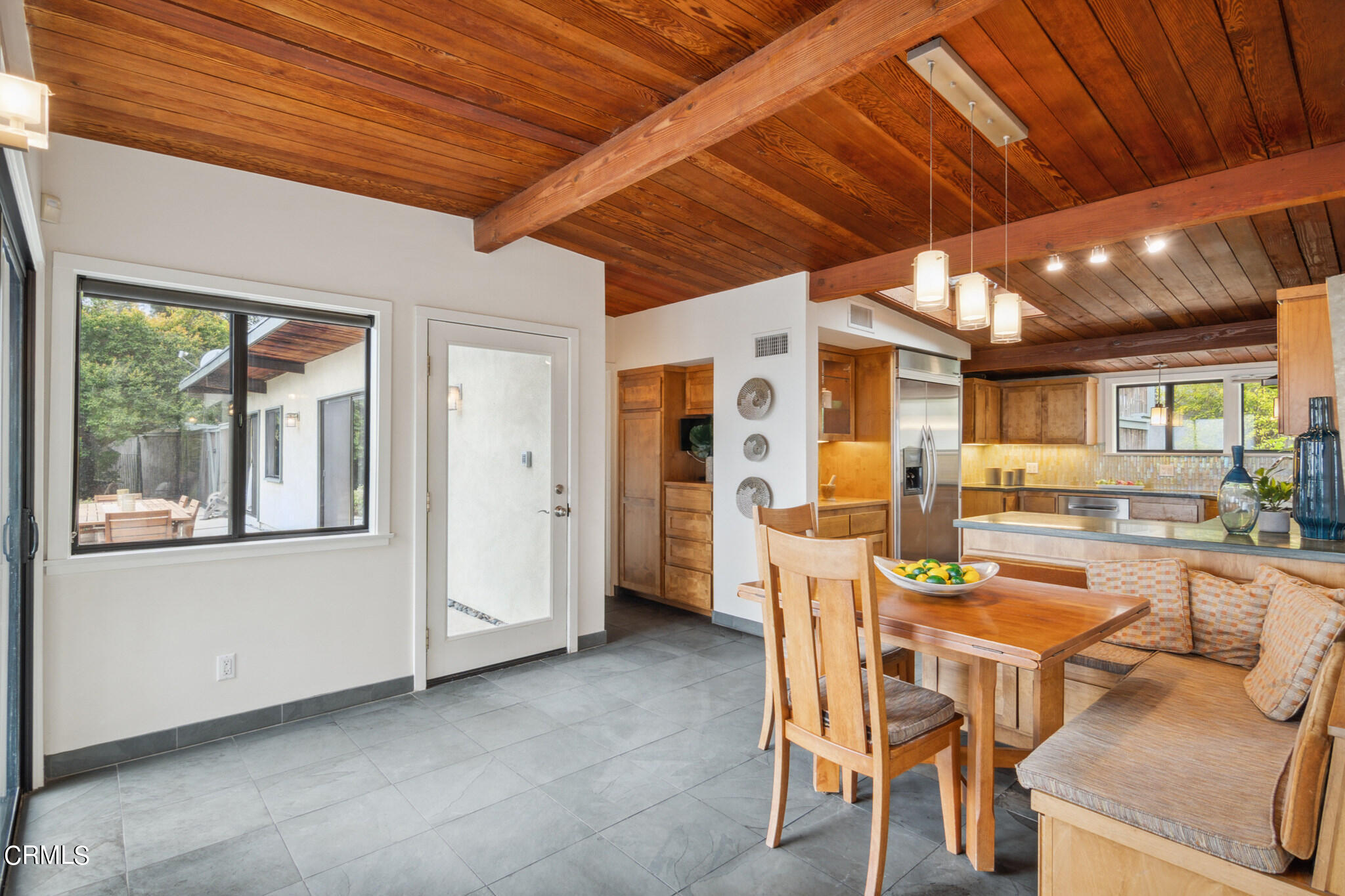 4554 Rising Hill Road Altadena, CA 91001 - Photo 15 of 56 a view of a dining room with furniture window and outside view