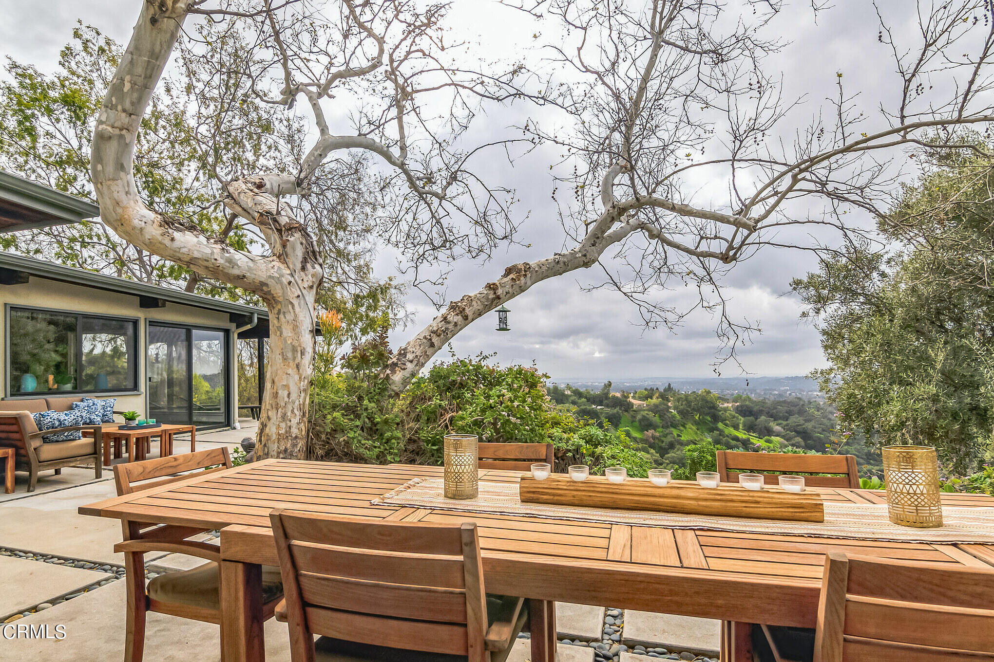 4554 Rising Hill Road Altadena, CA 91001 - Photo 33 of 56 a view of a patio with table and chairs and couches