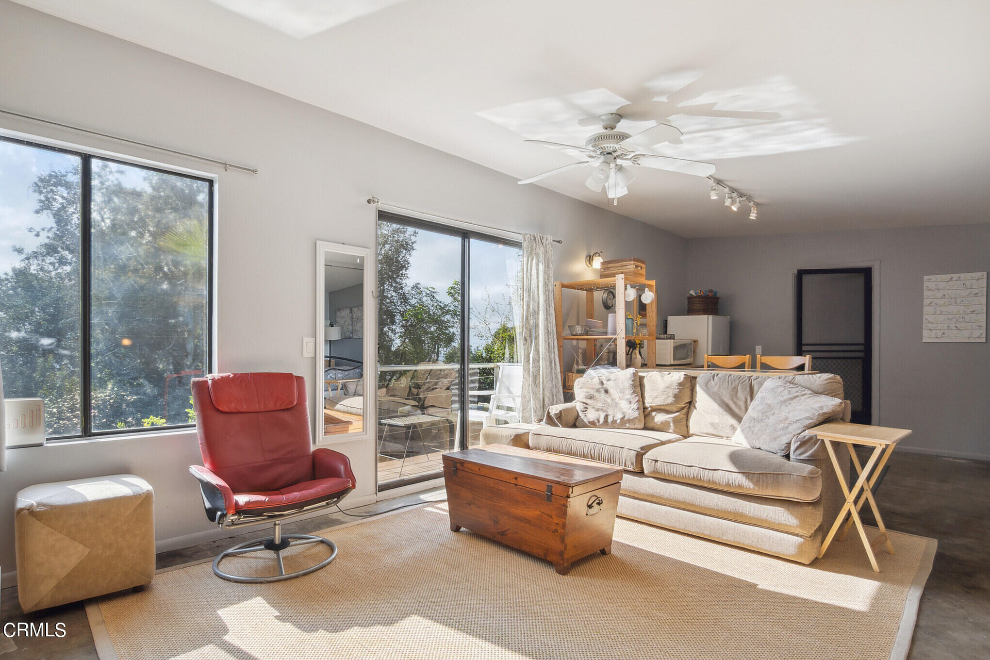 4554 Rising Hill Road Altadena, CA 91001 - Photo 34 of 56 a living room with furniture and a large window