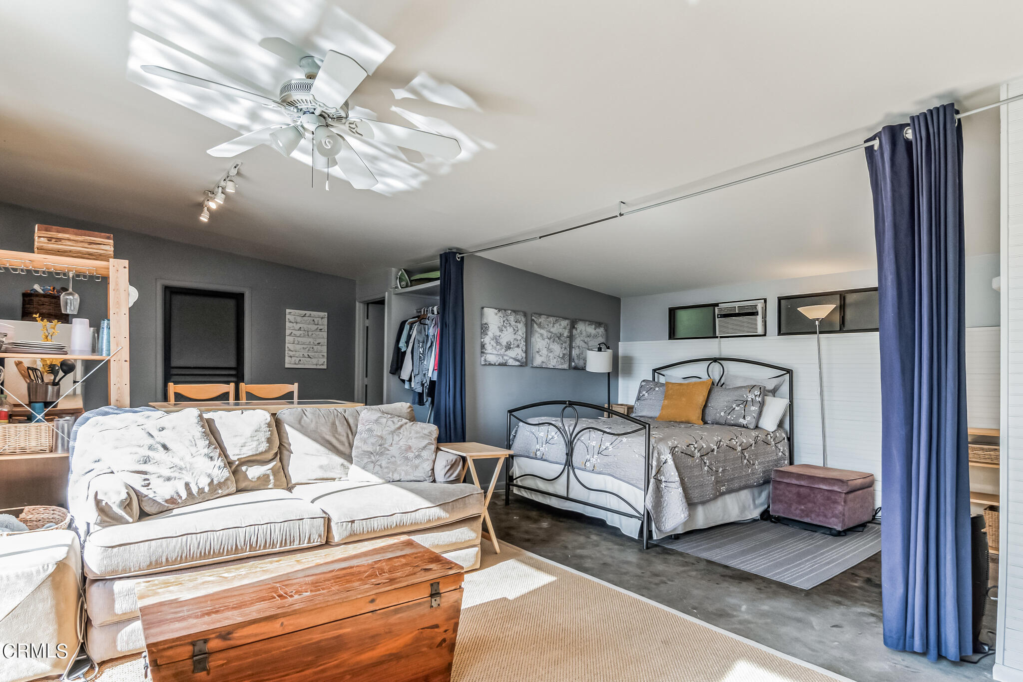 4554 Rising Hill Road Altadena, CA 91001 - Photo 35 of 56 a living room with furniture and a chandelier