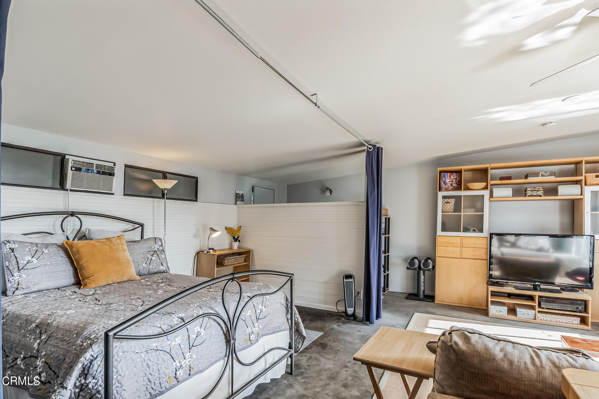 4554 Rising Hill Road Altadena, CA 91001 - Photo 36 of 56 a bedroom with a bed and furniture