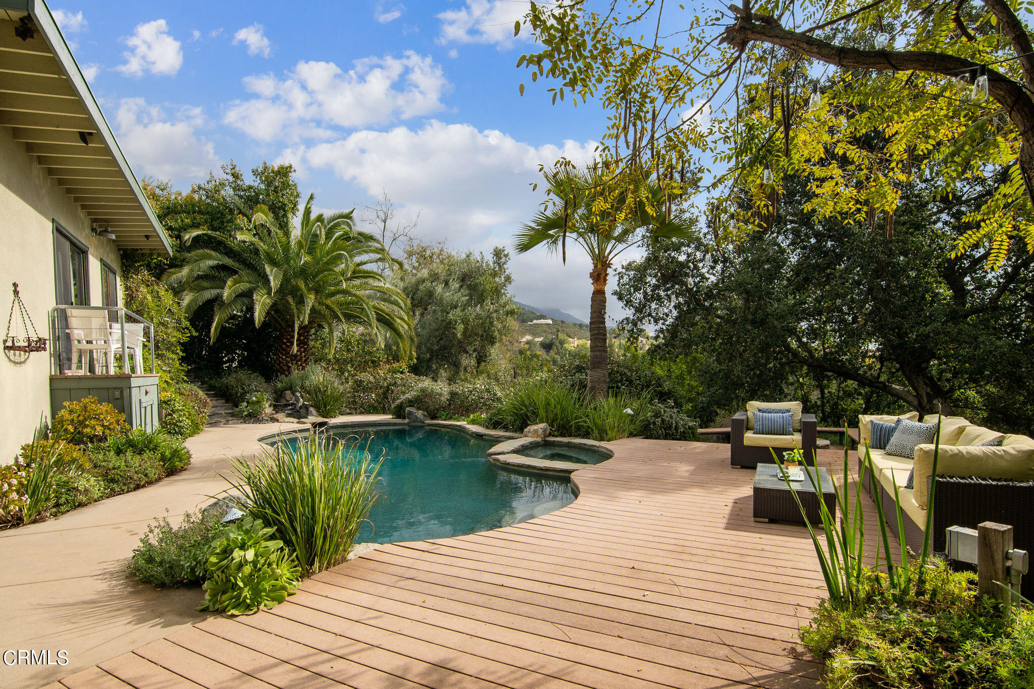 4554 Rising Hill Road Altadena, CA 91001 - Photo 40 of 56 a view of a swimming pool with a patio