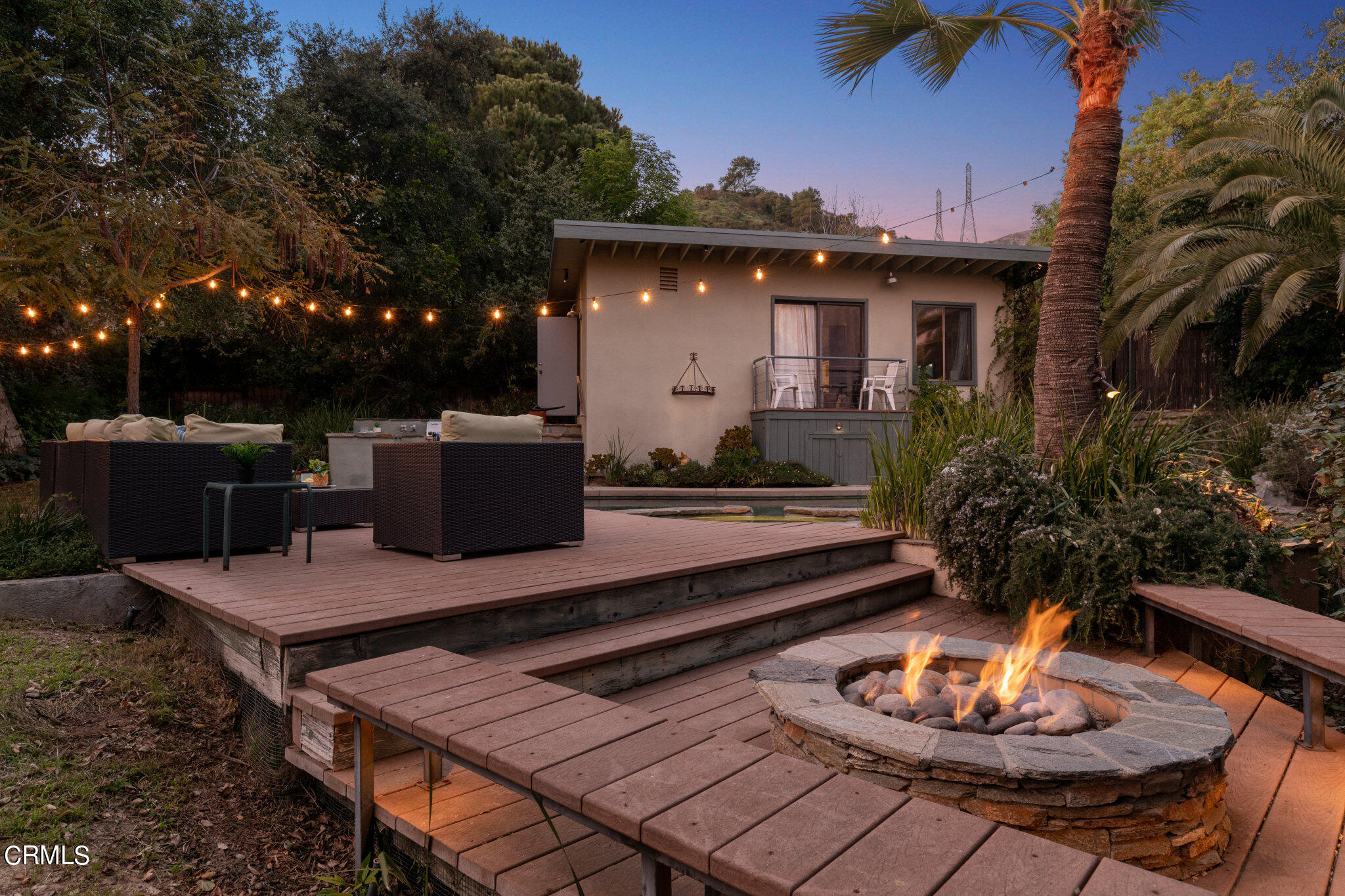 4554 Rising Hill Road Altadena, CA 91001 - Photo 42 of 56 a view of a house with backyard and sitting area