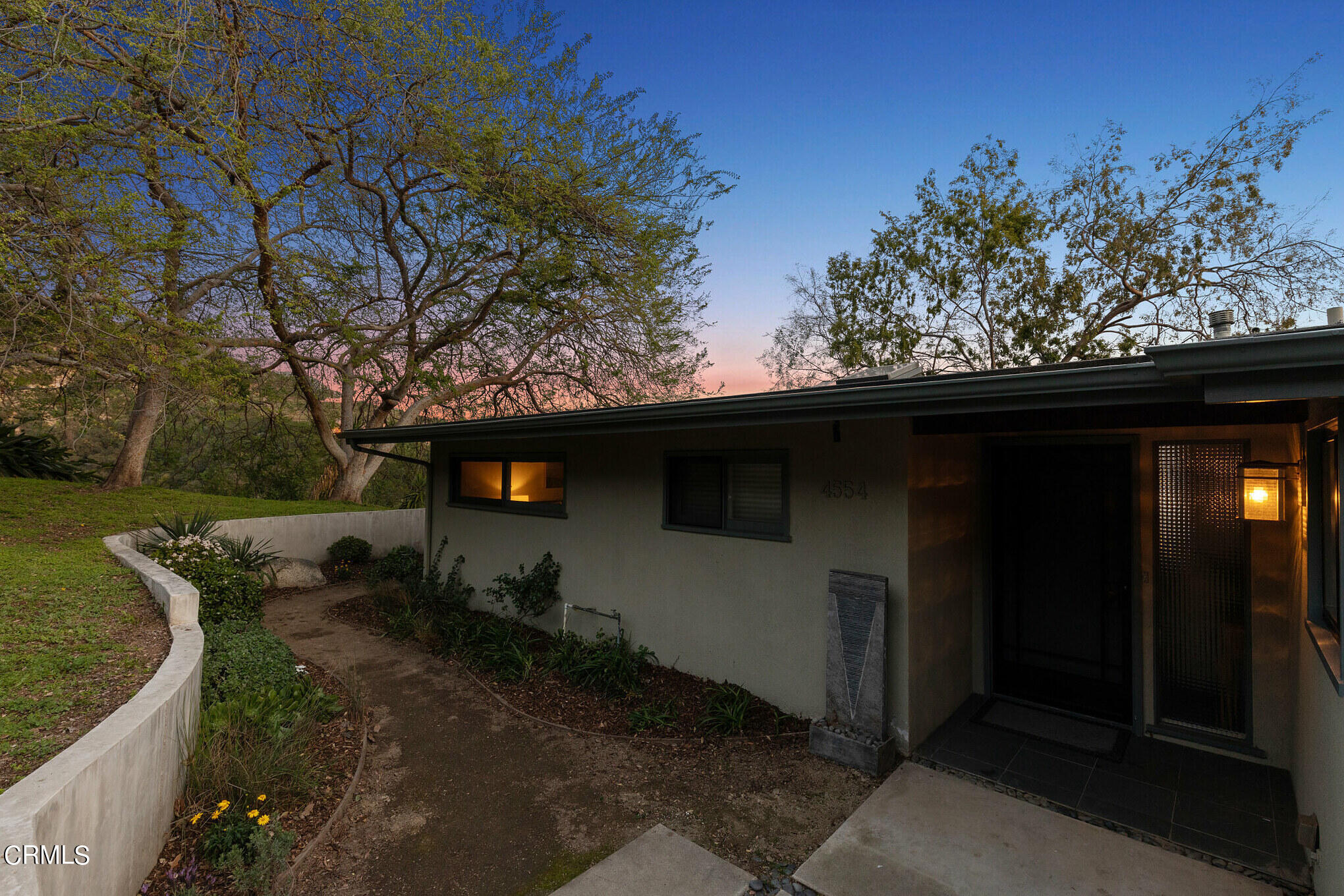 4554 Rising Hill Road Altadena, CA 91001 - Photo 53 of 56 a backyard of a house with lots of green space
