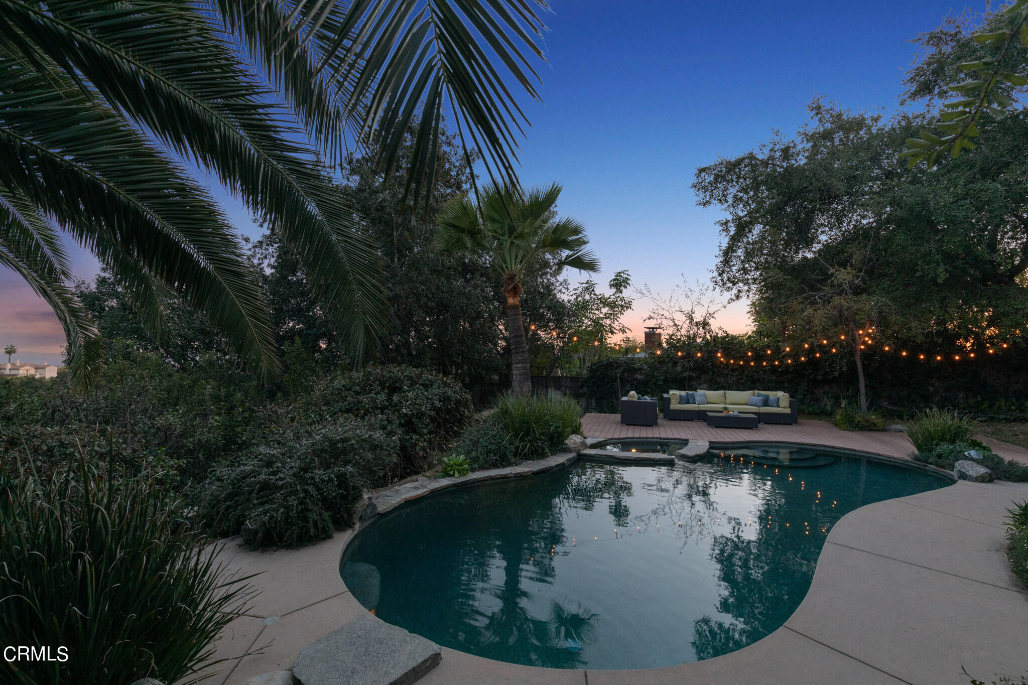 4554 Rising Hill Road Altadena, CA 91001 - Photo 8 of 56 a view of a water pond with green yard