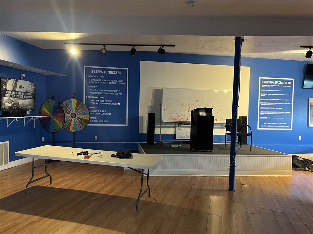 1768 Pleasant Street Fall River, MA 02723 - Photo 7 of 10 a view of a room with gym equipment