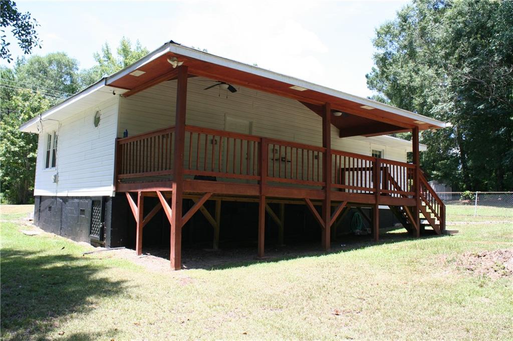 3735 South Seale Road Phenix City, AL 36869 - Photo 9 of 27 Back of property with a wooden deck and crawl space