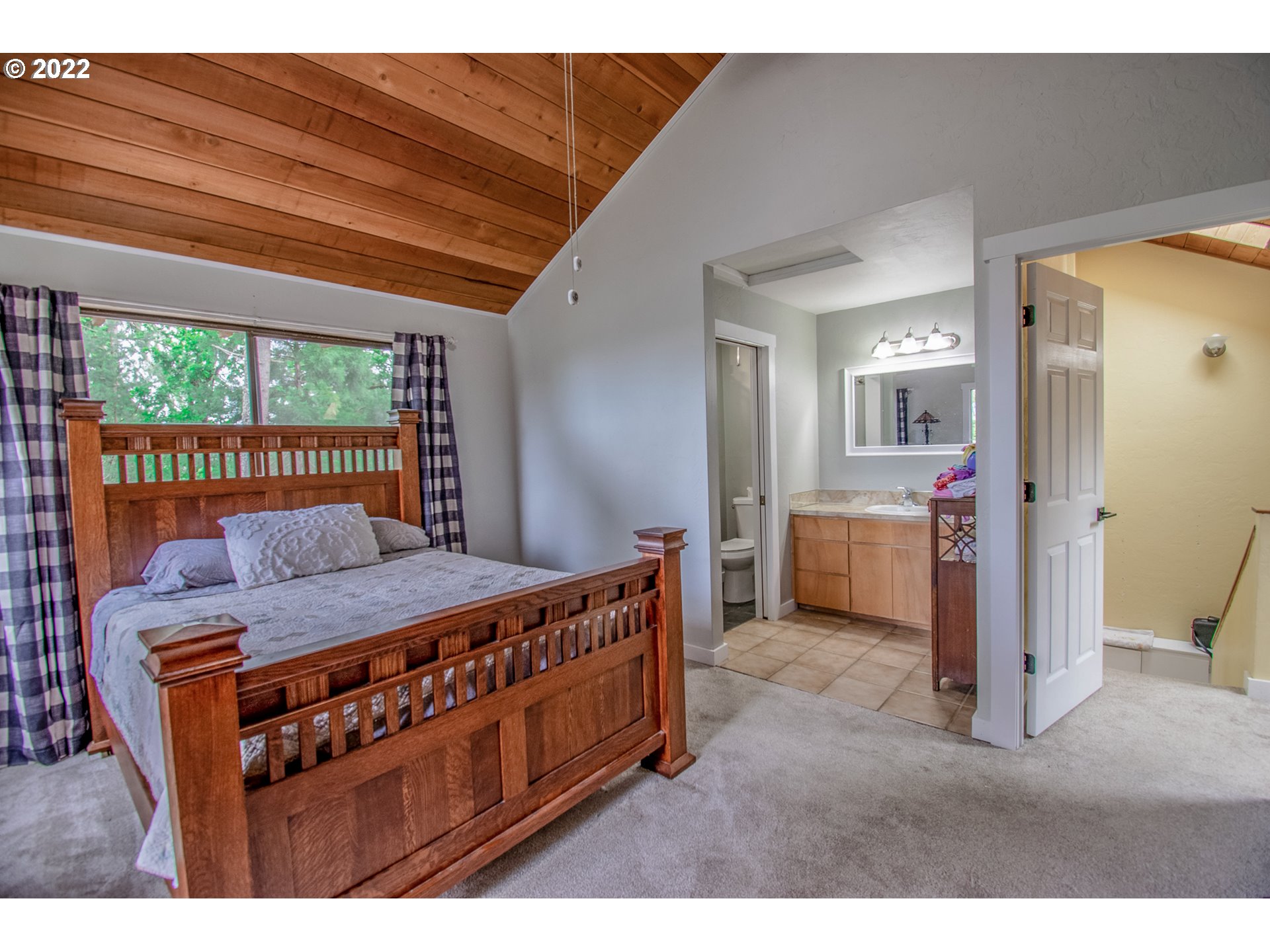 864 South 73rd Street Springfield, OR 97478 - Photo 29 of 30 a living room with a baby crib furniture and a wooden floor