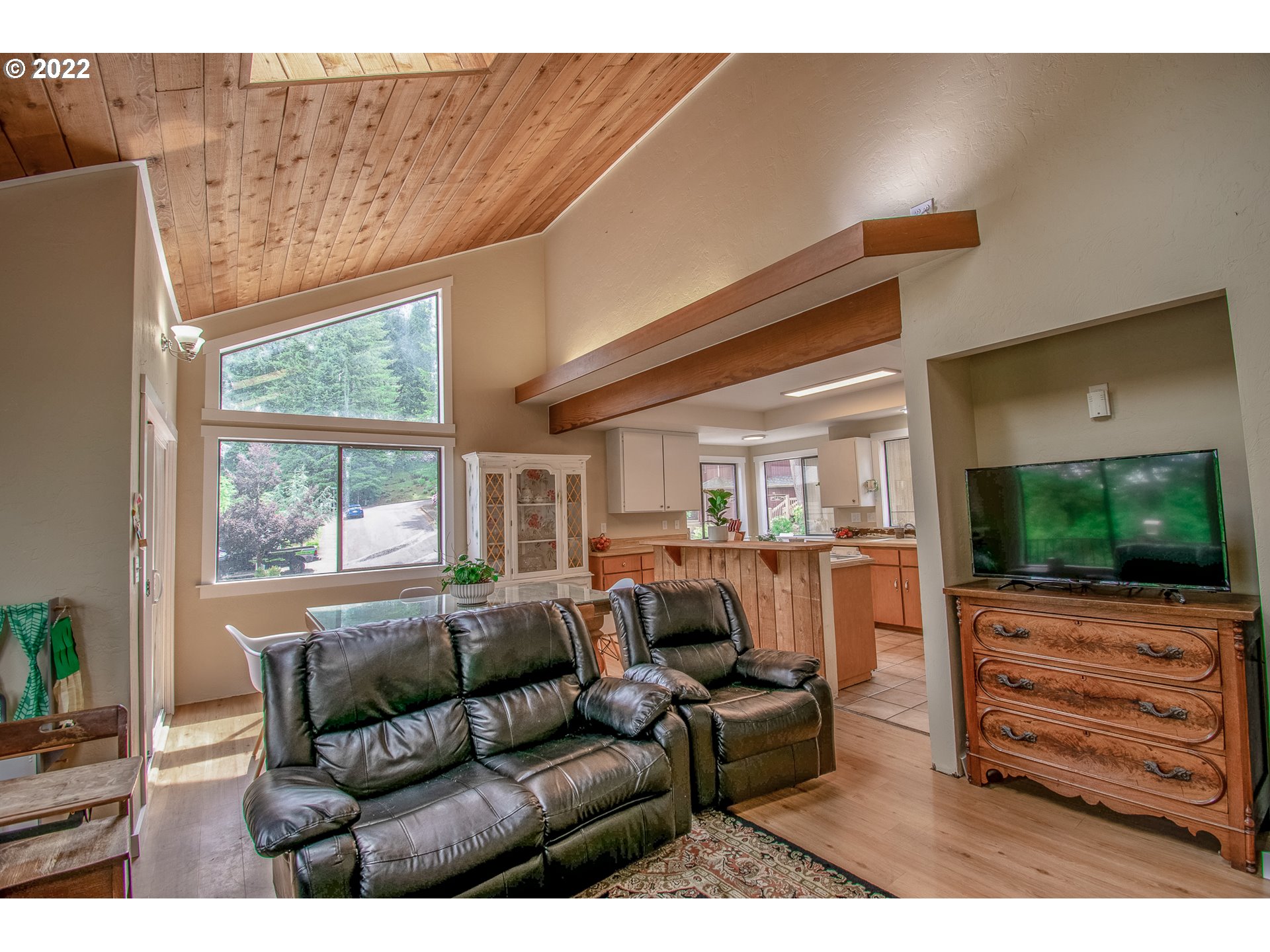 864 South 73rd Street Springfield, OR 97478 - Photo 4 of 30 a living room with furniture and a flat screen tv