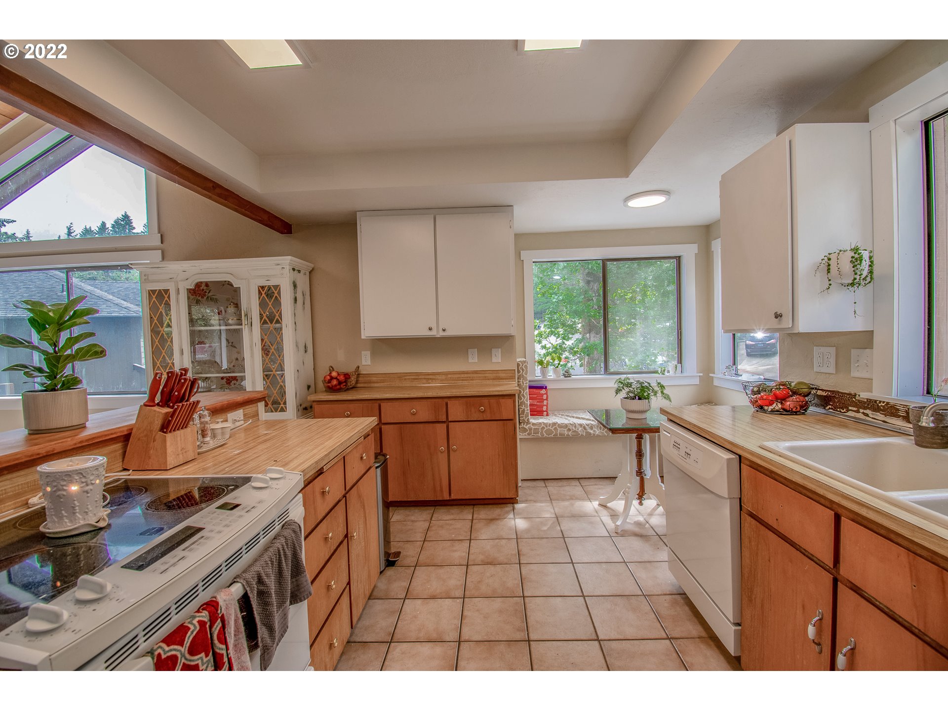 864 South 73rd Street Springfield, OR 97478 - Photo 7 of 30 a open kitchen with a sink stove and cabinets