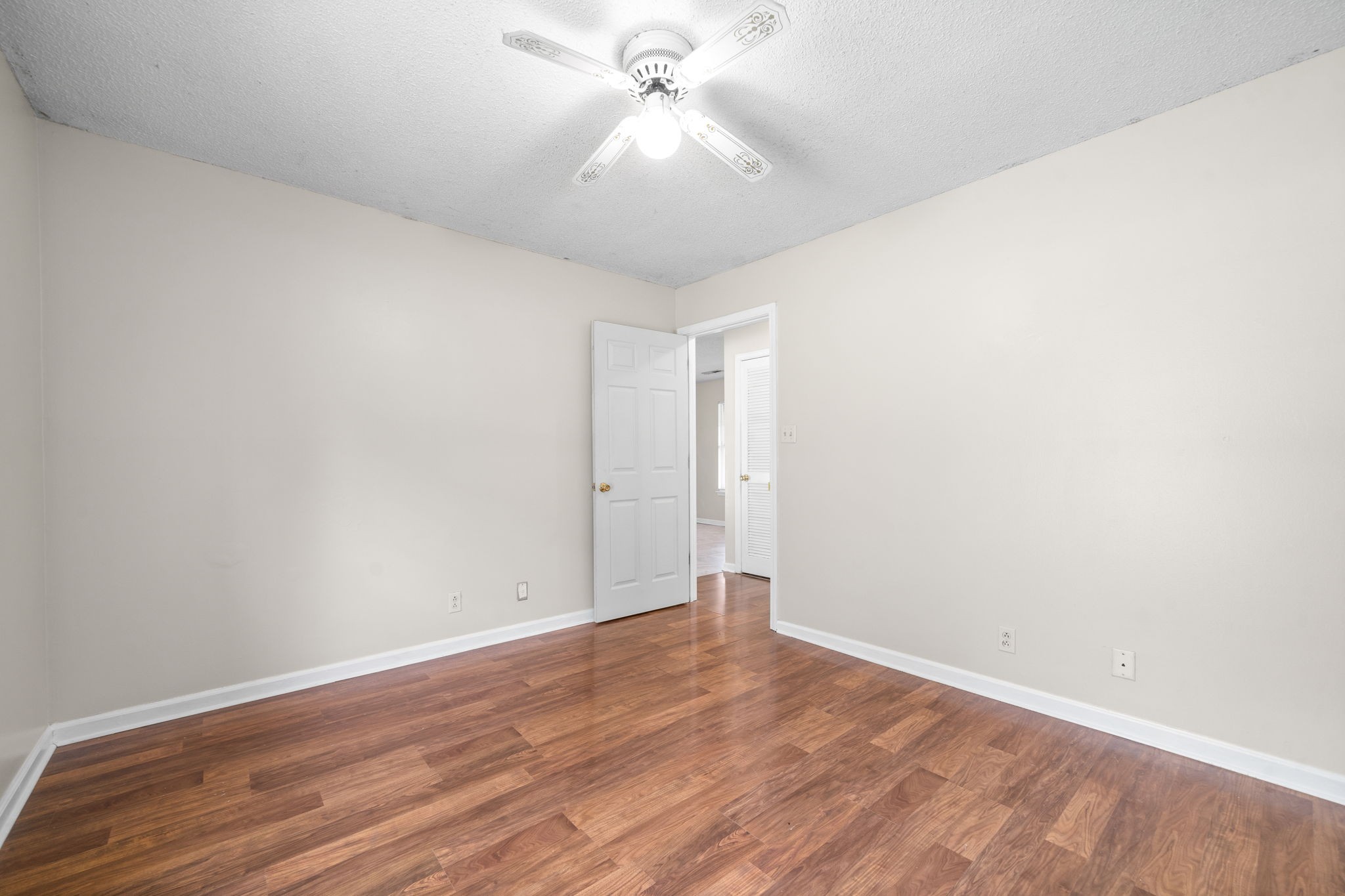 241 Bumpus Mill Road Oak Grove, KY 42262 - Photo 18 of 31 a view of an empty room with wooden floor